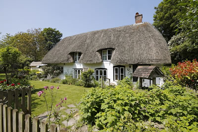 photograph of thatched cottage